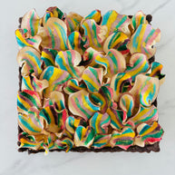 Square chocolate tart made with chocolate shortbread shell, almond frangipane filling and decorated with hand-painted crispy apple chips. 