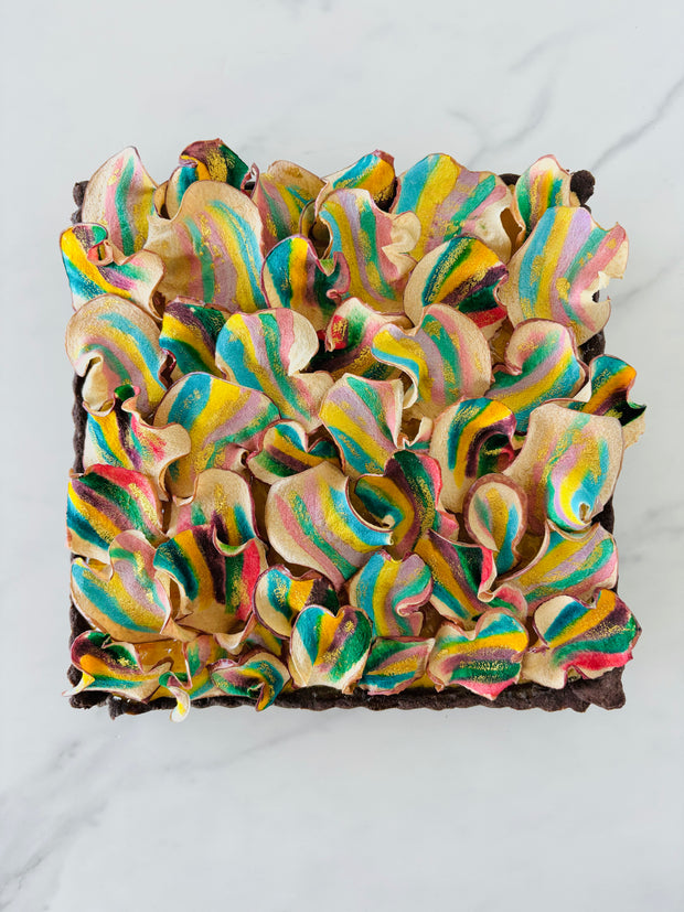 Square chocolate tart made with chocolate shortbread shell, almond frangipane filling and decorated with hand-painted crispy apple chips. 