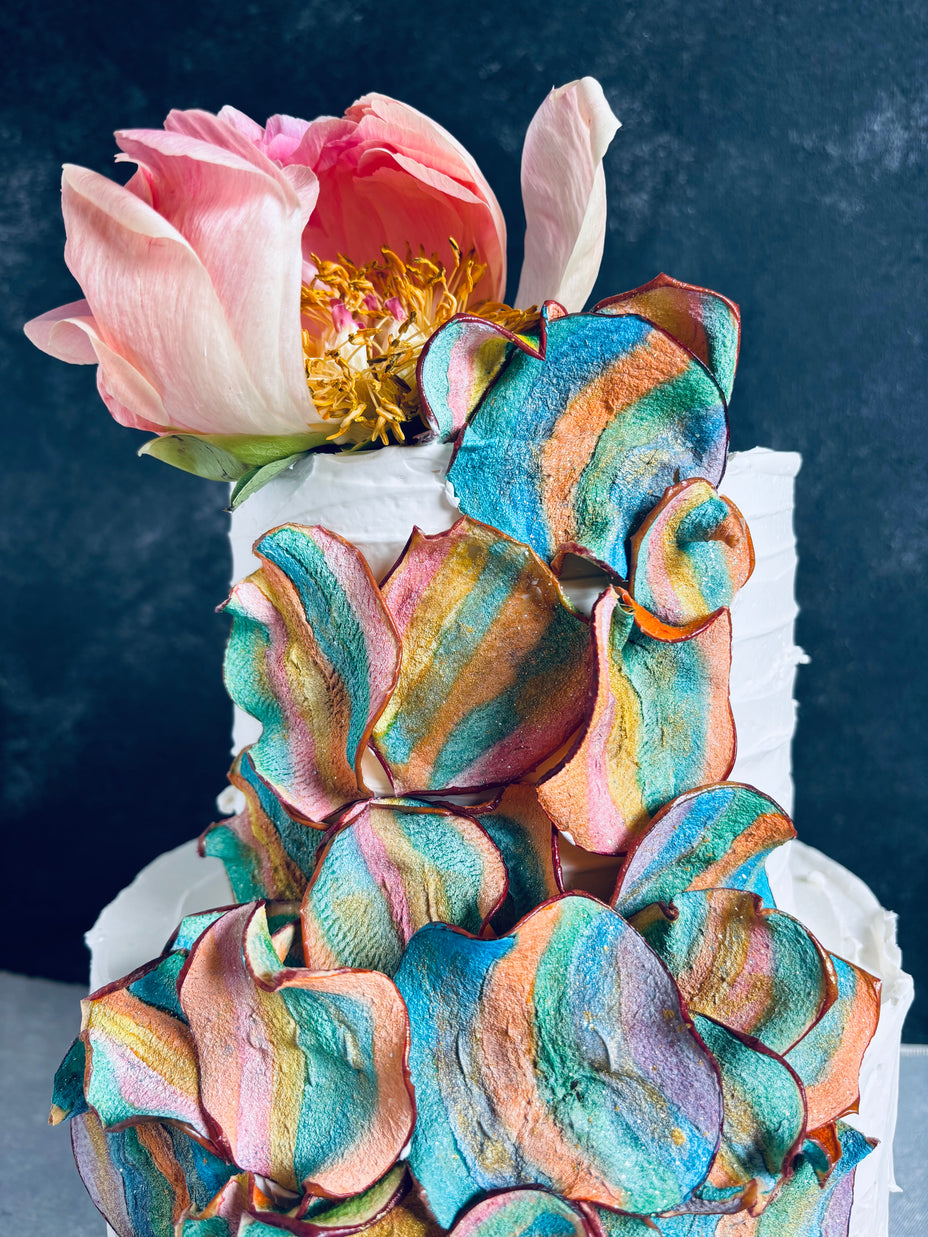 Elegant Italian wedding cake in Honolulu, featuring hand-painted apple slices and smooth Swiss vanilla buttercream frosting