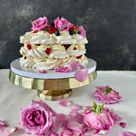 Custom Cakes for Every Occasion. Vanilla Pavlova cake in Honolulu. This vanilla pavlova is made with crispy meringue layers, white chocolate chantilly filling and decorated with fresh roses, lavender and fresh berries.